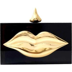 Highly sought after Charlotte Olympia Dali clutch